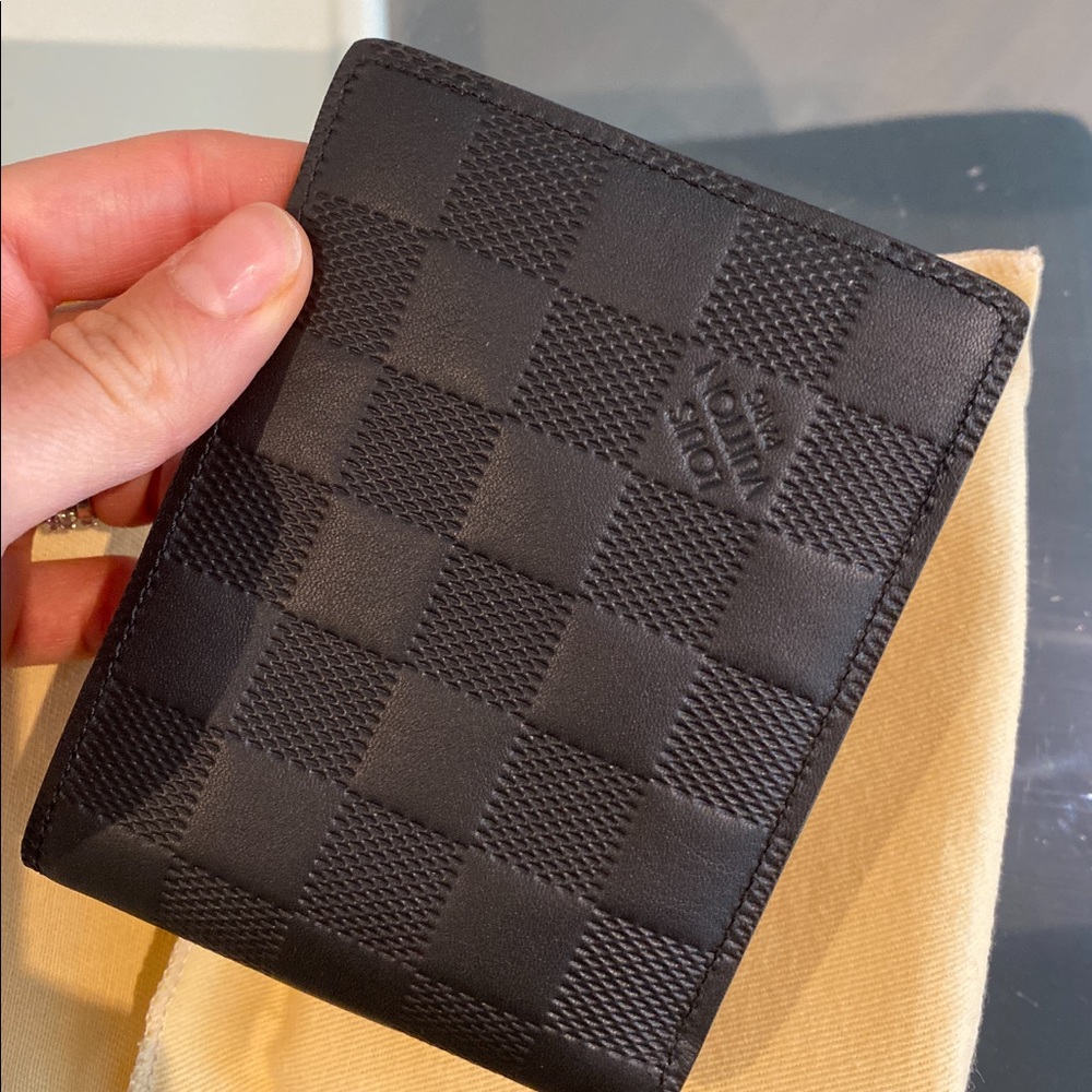 Brand new Louis Vuitton Damier Infini Wallet